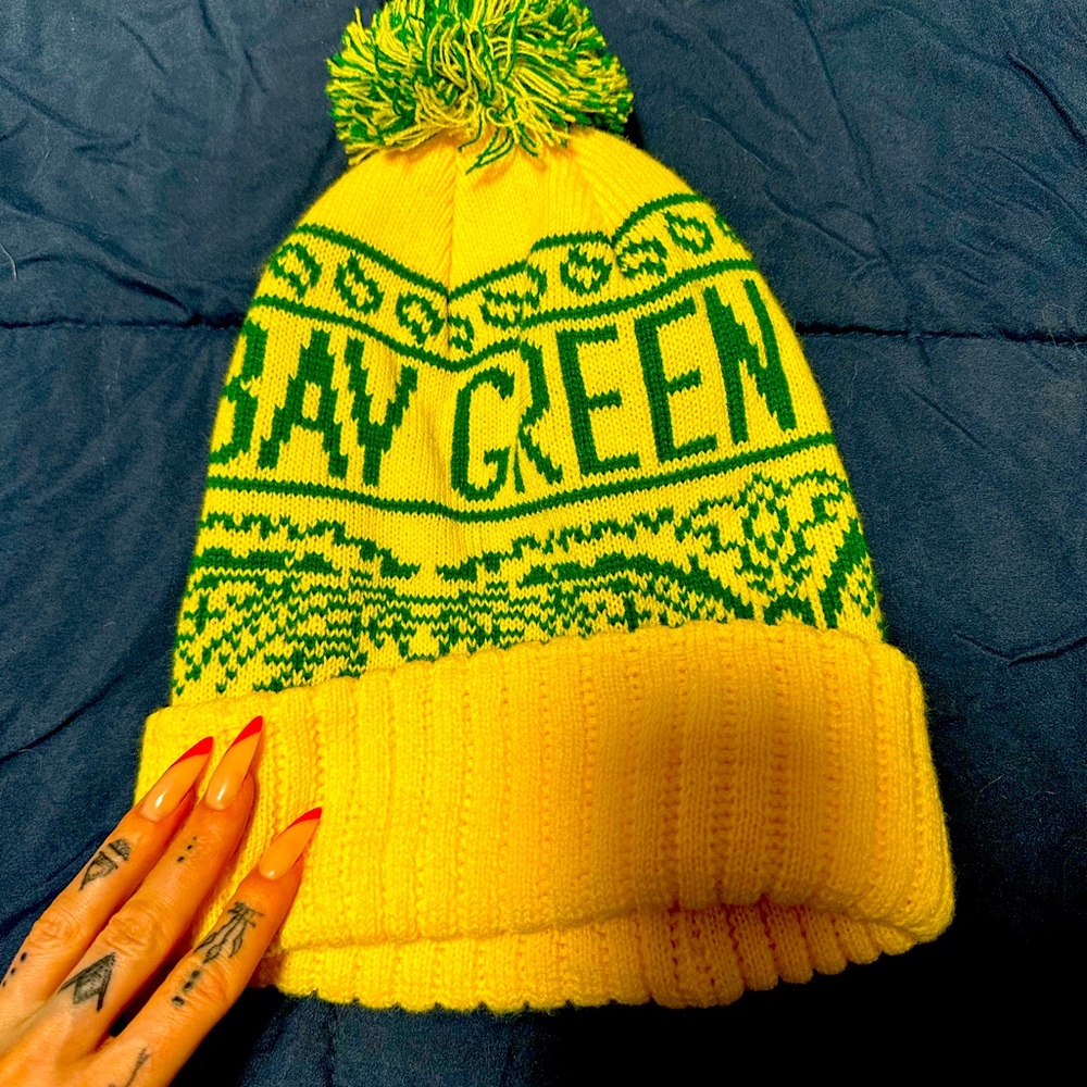 Green Bay Packers hat.
